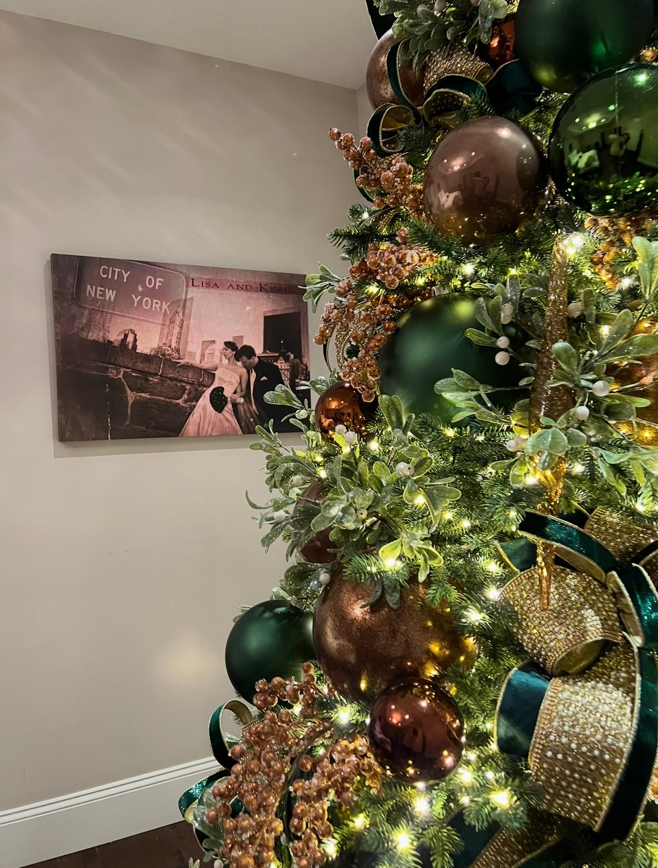 Traditional Christmas tree with large gold north stars — full view